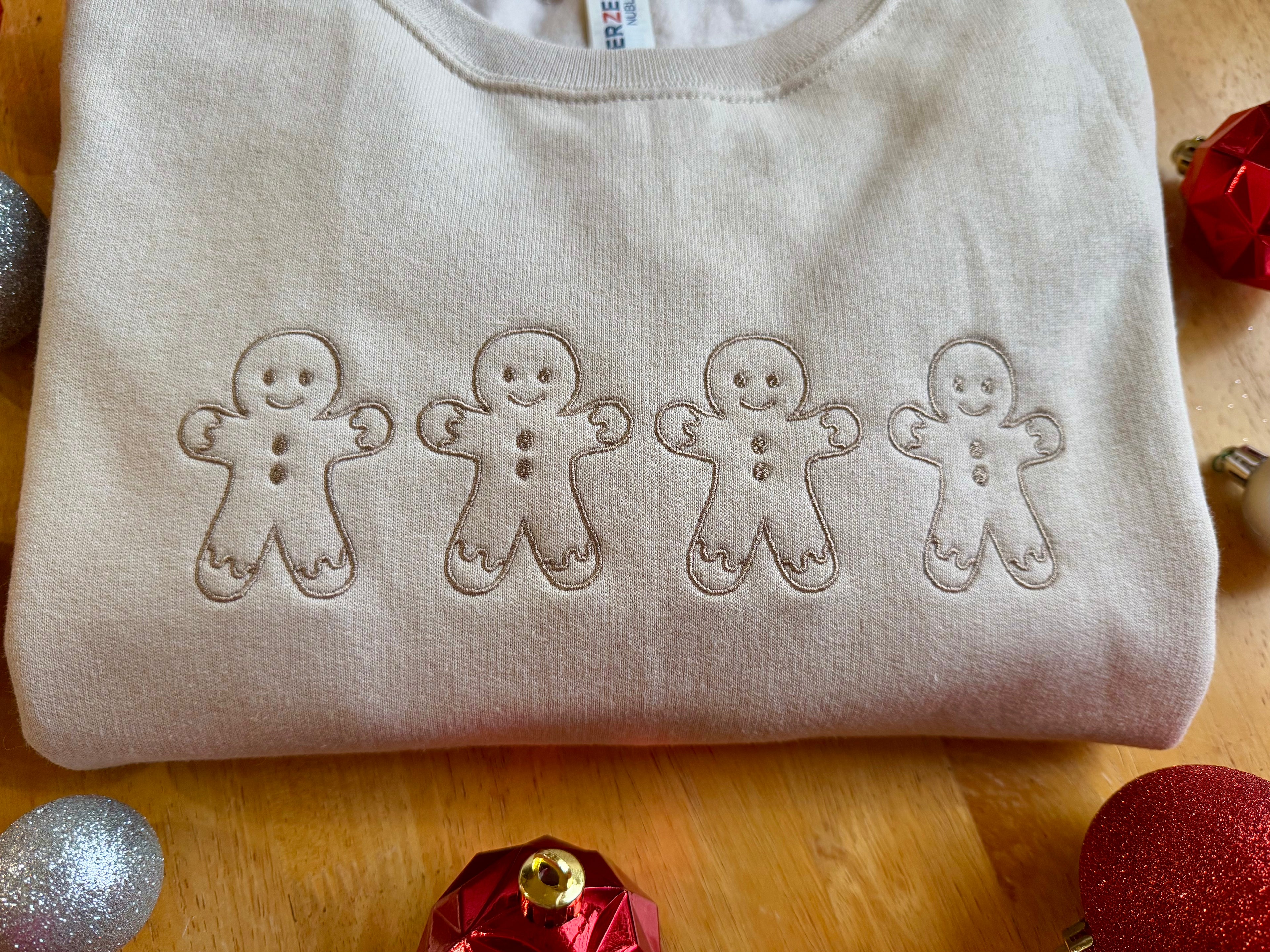 embroidered gingerbread man sweatshirt ￼
